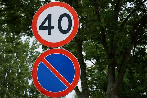 Premium Photo Speed Limit And No Parking Signs At City Street