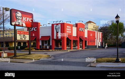 Exterior Of Kfc Kentucky Fried Chicken Fast Food Restaurant With Drive