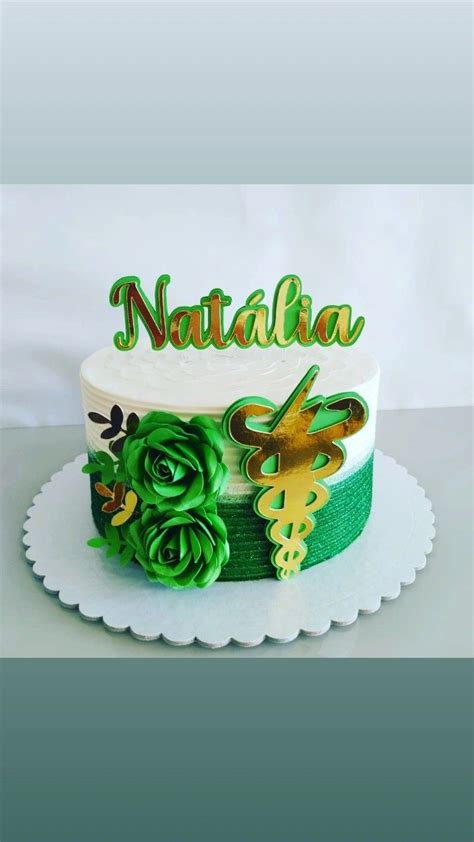 A Cake Decorated With Green Flowers And The Word Nattilia On Top Is