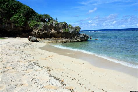 Swimming at Anahulu Beach on Tongatapu Island - Geographic Media