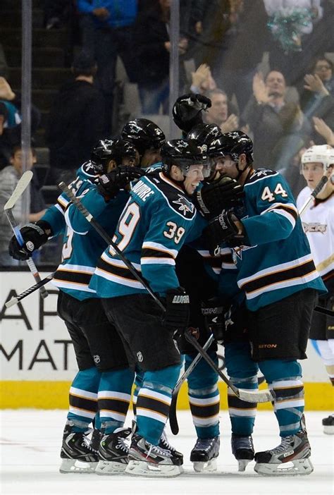 Logan Couture 39 Of The San Jose Sharks Is Congratulated By Teammates After Couture Scored The