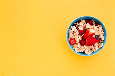 Free Photo | Delicious healthy breakfast on a yellow background