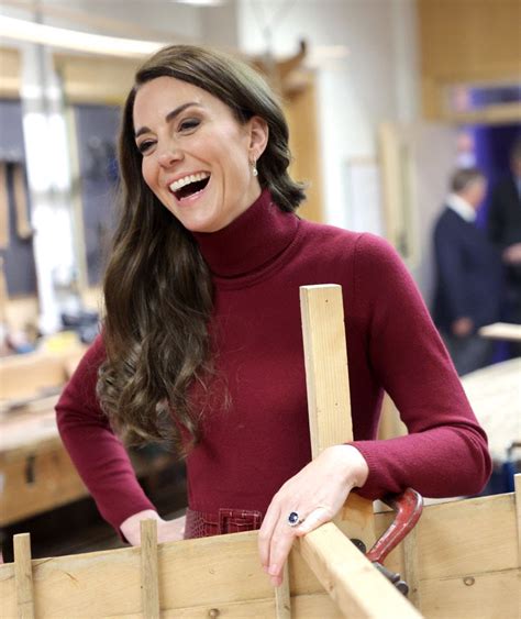 The Princess of Wales is winter-chic in red midi dress