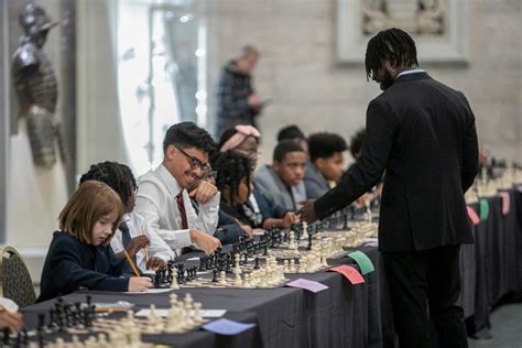 An international master and young Detroit chess players created ...