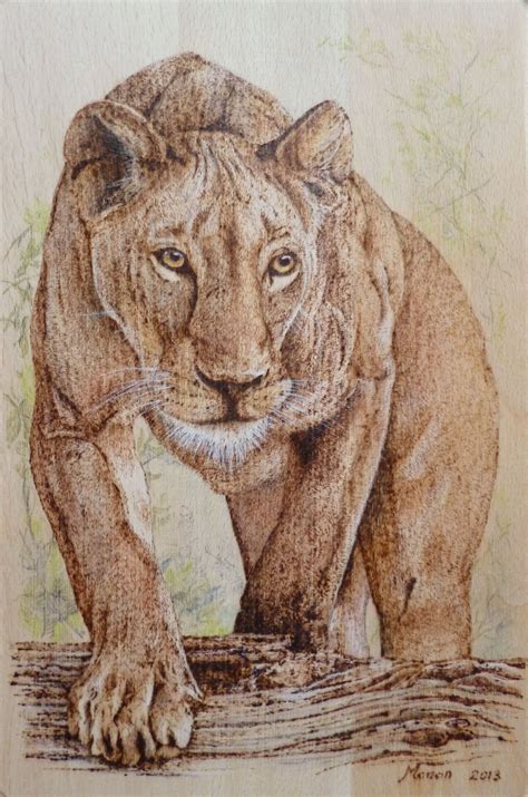 Pyrography on wood. A lioness stalking. Manon Massari. https://www ...