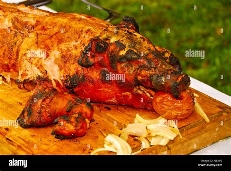 Lechon Whole Roast Suckling Pig Display On Platter Apple In Mouth