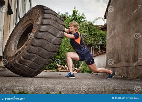 Woman Flipping A Tire Crossfit Training Stock Image Image Of Power