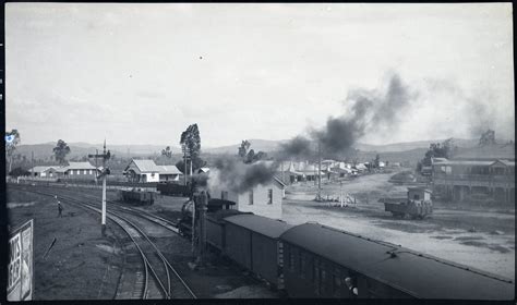 Steam Train At Helidon Railway Station Houses And Shops In Background