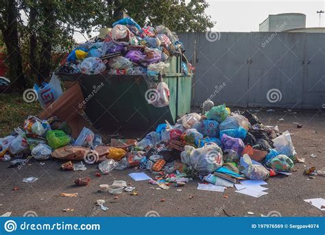 Overflowing Dumpster With Rubbish Lying Around Editorial Stock Image