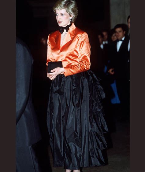 Diana Teamed Her Black Evening Skirt With Bustle With An Orange Jacket