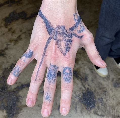 Pin On Tattoos Hand Tattoos Hand Tattoos For Guys Tattoos For Guys