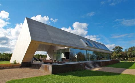 Minimalist Home With Unique Interpretation Of Gabled Roof