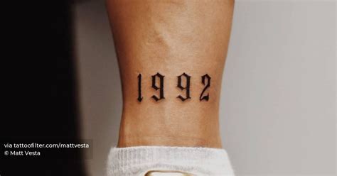 1992 Lettering Tattoo On The Ankle