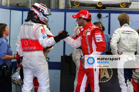 L To R Fernando Alonso Esp Mclaren Congratulates Pole Sitter