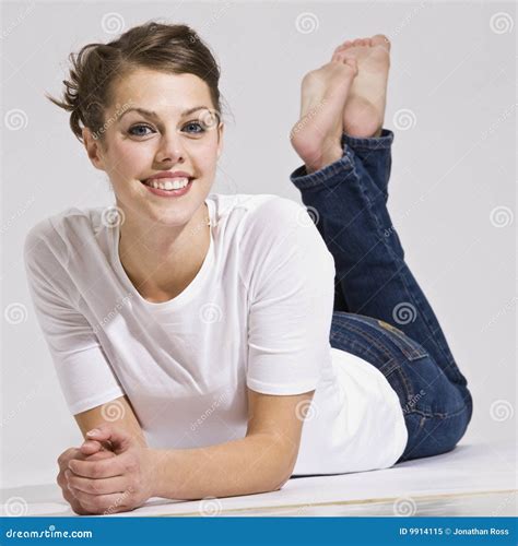 Attractive Woman Lying Down And Smiling Stock Image Image Of