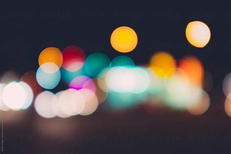 Abstract Of Car And Street Lights At Night Blurred Focus By Stocksy