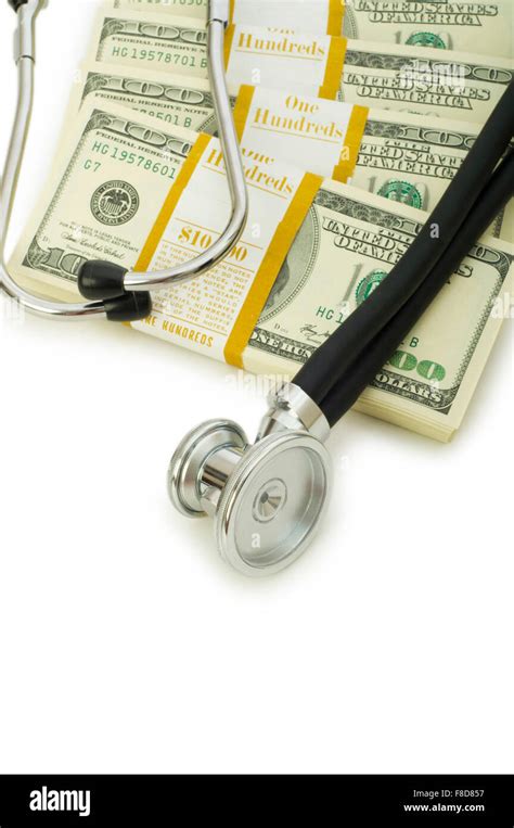 Concept Of Expensive Healthcare With Dollars And Stethoscope Stock