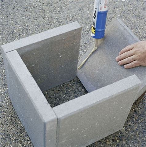 Simple DIY Concrete Outdoor Planters From Pavers - Shelterness