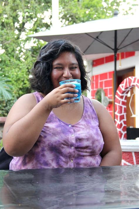 Year Old Latina Woman Drinks An Azulito Cocktail Or Alcoholic Drink With The Frosty Glass And