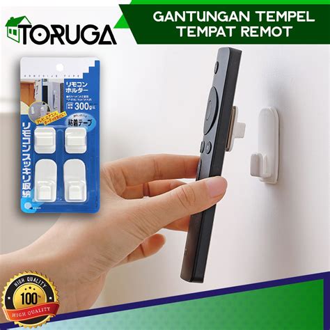 Jual TEMPELAN HOOK REMOTE AC TEMPELAN GANTUNGAN DINDING SERBAGUNA ISI 2