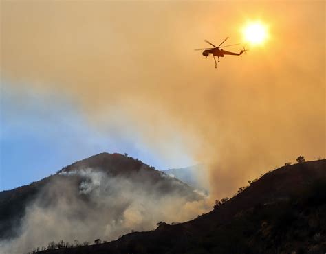 Helicopter pilots discuss different approaches to aerial firefighting ...