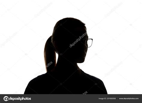 Silhouette Woman Glasses Looking Away Isolated White — Stock Photo © AntonMatyukha #251692836