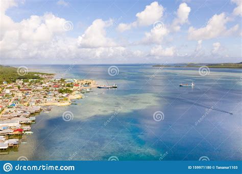 Sea Port In The City Of Dapa Philippines Fishing Village And Ships