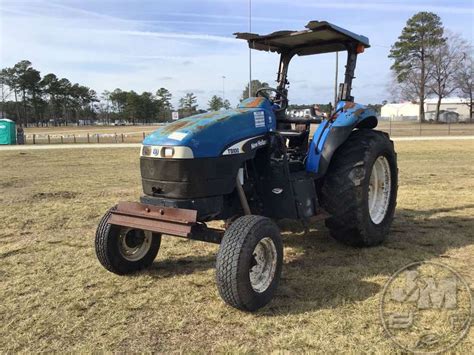 New Holland Tb100 Tractor Sn 82984247 Jeff Martin Auctioneers Inc