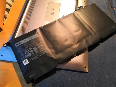 Report Swollen Battery Replacement For The Dell Xps With Dell Nbd