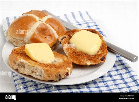 Hot Cross Buns With Butter Stock Photo Alamy