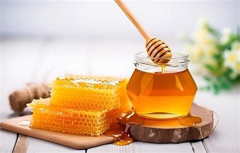 Premium Photo Fresh Honey In Jar And Honeycombs On White Wooden Table