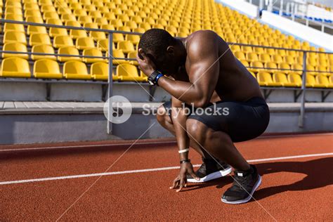 Tired African Male Athlete Finished Running And Resting While Sitting