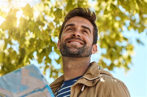 Its A Bright New Day In A Foreign City A Happy Tourist Using A Map To