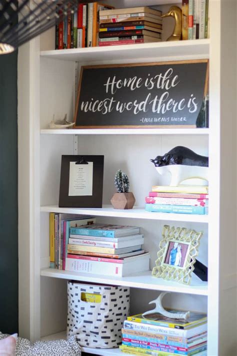 reading nook  built  bookshelves bright green door
