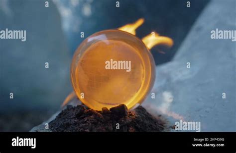 Burning Earth Planet On Fire Glass Globe On Fire Glacier On The Background Stock Video