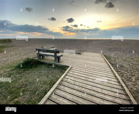 The Thorpeness beach at sunrise Stock Photo - Alamy