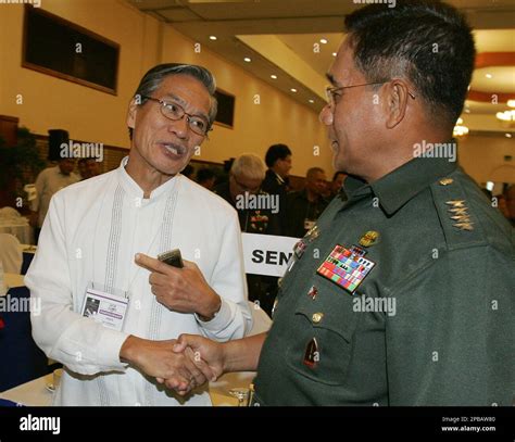 Left Wing Congressman Satur Ocampo Left Shakes Hands With Philippine