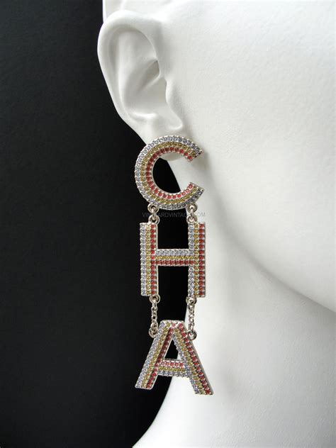 CHANEL ULTRA RARE CRUISE 2023 RAINBOW CRYSTAL LETTER EARRINGS