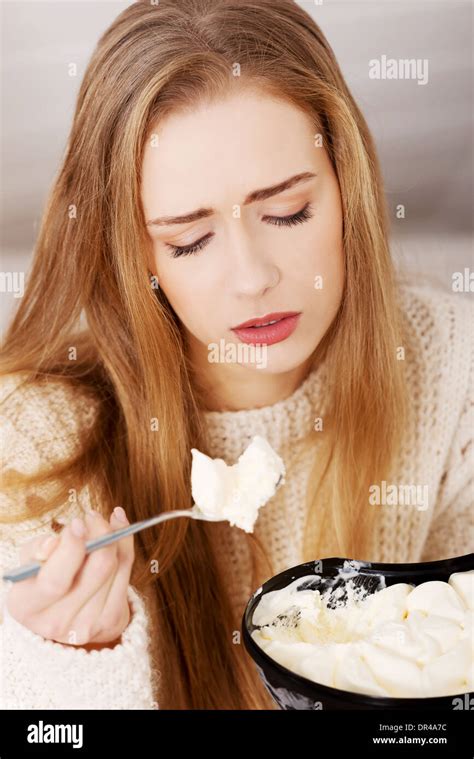 Binge Eating Ice Cream Hi Res Stock Photography And Images Alamy