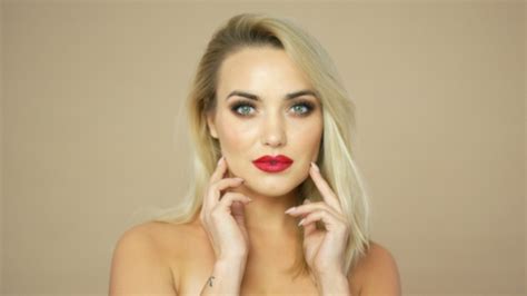 Blonde Woman Touching Face Stock Footage VideoHive