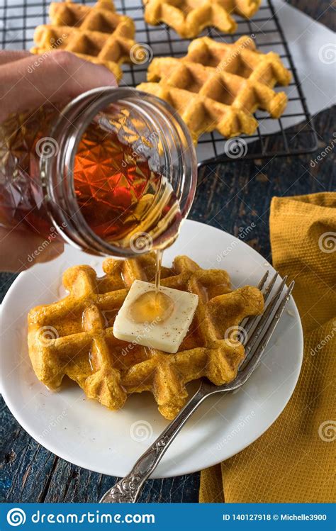 Pouring Syrup On Homemade Pumpkin Waffles Stock Photo Image Of