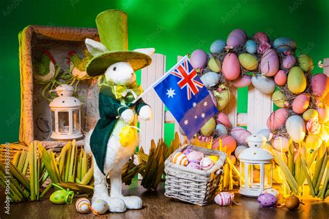 The Feast Of Easter Rabbit With Colorful Eggs Holiday Of Easter In