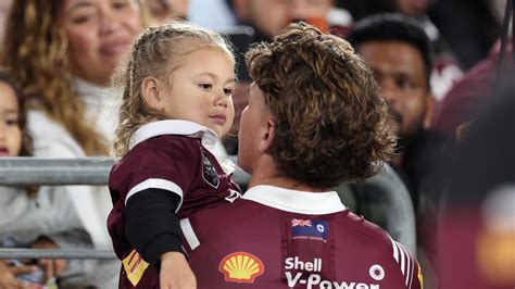 Image of Reece Walsh holding his daughter after being KO’d melts hearts ...