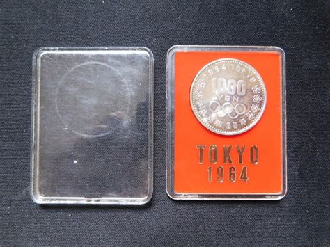 Yahooオークション 未使用 1964年 東京オリンピック記念 1 000円 銀