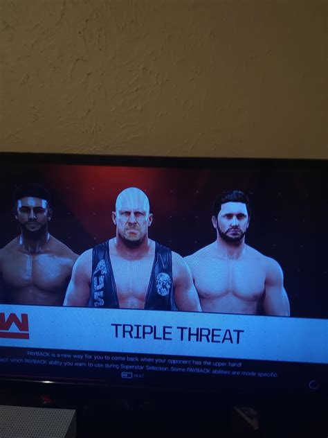 Number one contender match triple threat elimination Arron Mathews vs