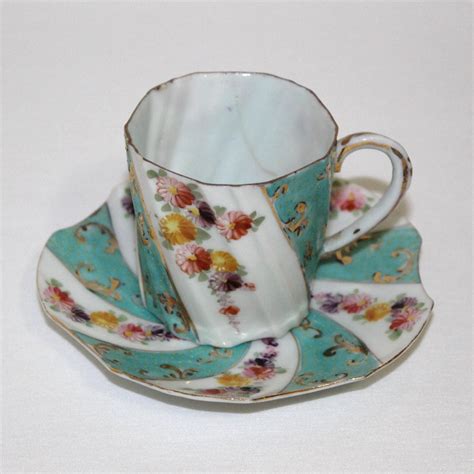 Antique Unmarked Nippon Hand Painted Tea Cup And Saucer