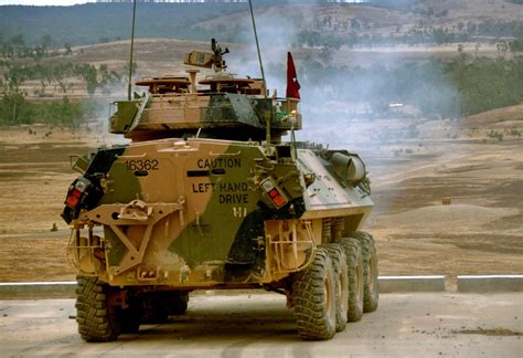 An Australian Light Armoured Vehicle Aslav Lined Up At The Range In