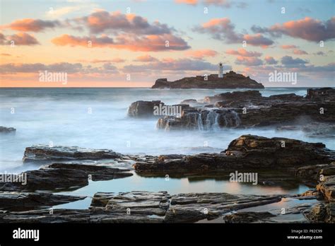 Godrevy Lighthouse captured at sunset Stock Photo - Alamy