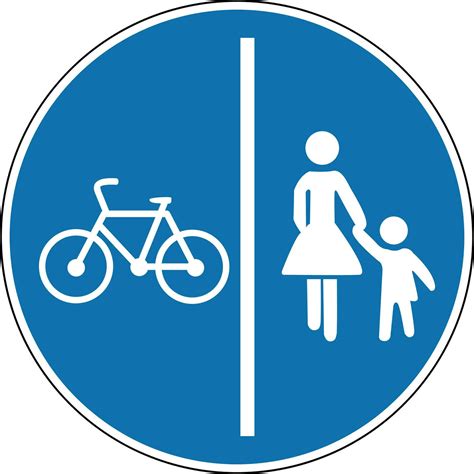 Pedestrian and bike path sign. Mandatory sign. Round blue sign