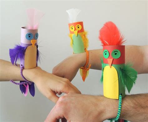 Thanks To Their Sturdy Pipe Cleaner Tethers These Wrist Parakeets Stay